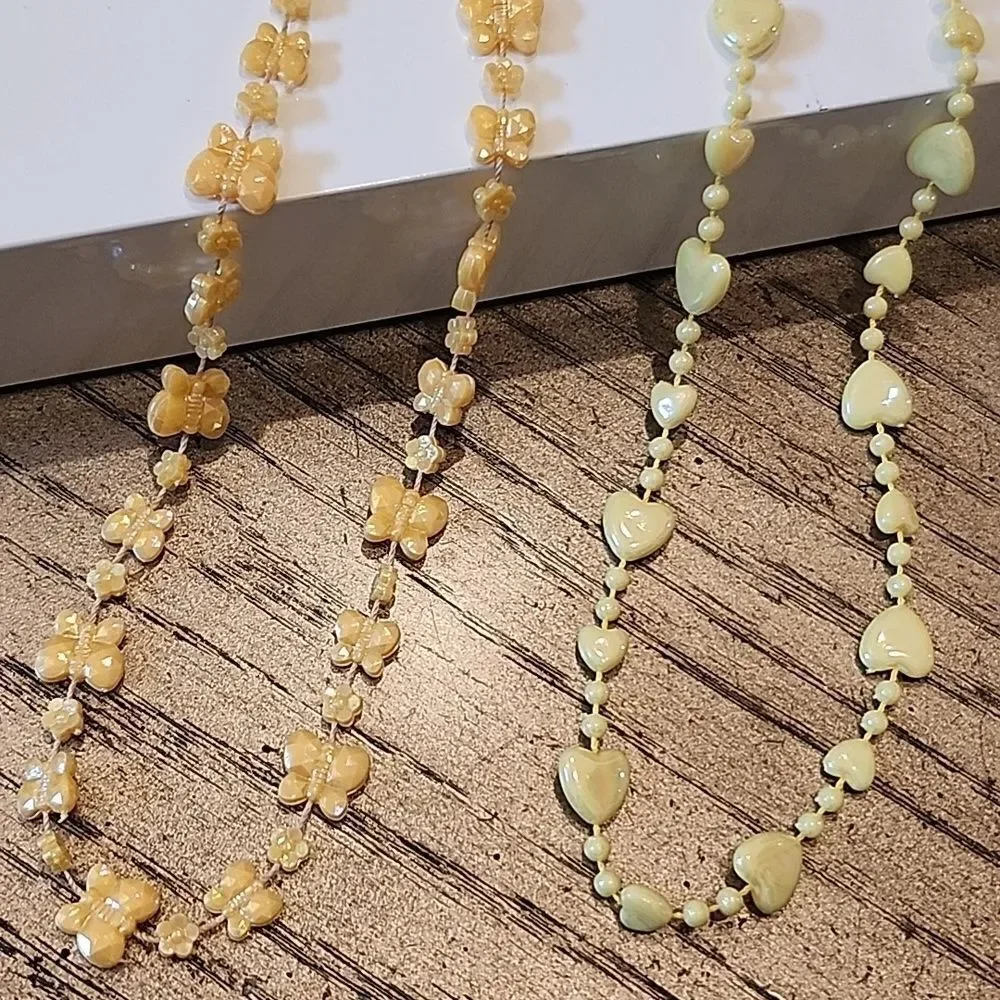 Kids play necklaces orange and yellow